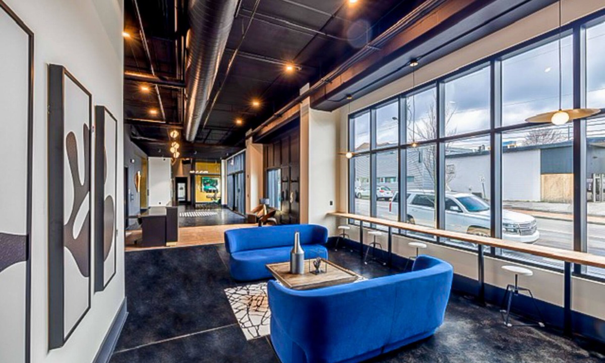 Rolling Mill Hill Condo | Muse | Nashville-themed condo with oversized balcony, downtown views & putting mat