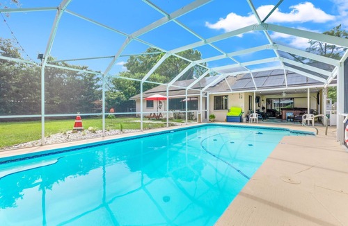 Palm Harbor House | 3BR 2.5 Bath Retreat-Brand New Pickleball Court, Heated Pool, Hot Tub, Game Room