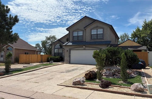 Cheyenne Meadows House | 4-BR Stratmoor Hills Retreat with Hot Tub, BBQ, Fire Pit - Near All Attractions