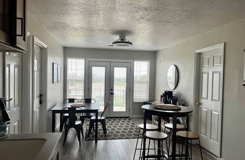 Emery County House | 8 Bedroom 6 Bathroom home with kitchen, dining room area and lounge.