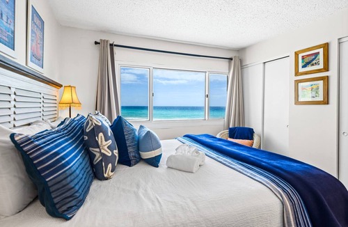 Sunnyside Condo | Beachfront Charm Meets Lake Life + Free Tickets: Dolphin Cruise & More!
