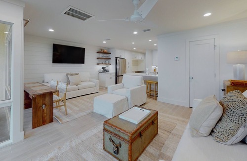 Fort Bay Condo | Bright condo on the Gulf with pool, beach access, hot tub, balcony & central AC