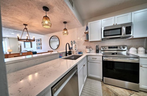 Riviera Beach Villa | Coastal 2BR/1BA Retreat w/Water Views & Fenced Patio in Panama City Beach