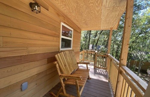 Winslow Cabin | Cowboy Cabin is nestled in a little woodland village – playground, pond and more