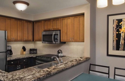North Park City Villa | Cozy 2-bedroom ski in ski out apartment in charming Park City with AC and gym