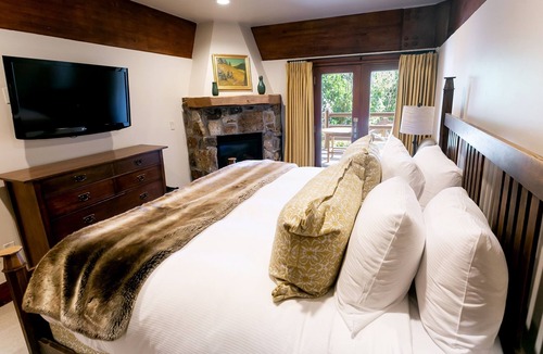 Deer Valley Cabin | Deluxe King Room with Fireplace by RedAwning