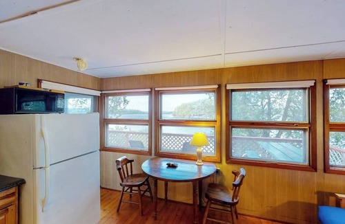 Charlotte Cottage | Dog-friendly bay-front cabin w/screened in porch & great views - next to trails