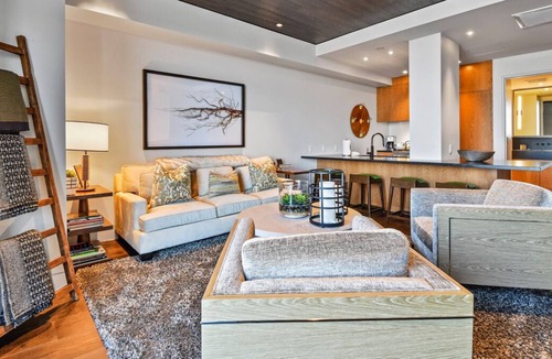 Empire Pass Condo | Gorgeous 1-Bedroom Condo with Breakfast Bar and Fireplace