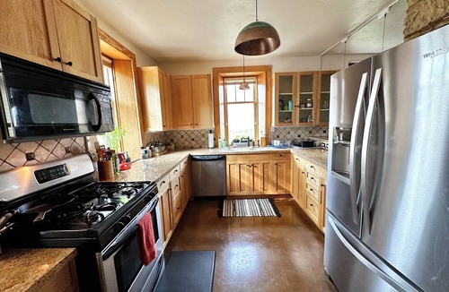 Cortez House | Historic Stone Home Under Bright Canyon Skies
