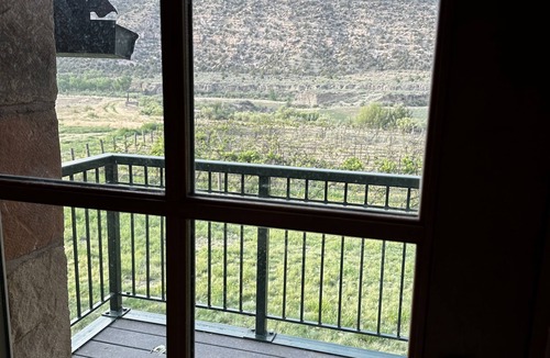 Cortez House | Historic Stone Home Under Bright Canyon Skies