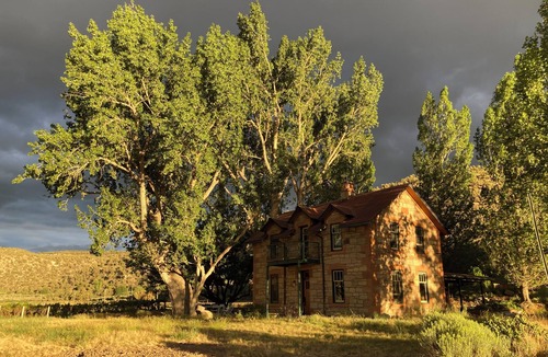 Cortez House | Historic Stone Home Under Bright Canyon Skies