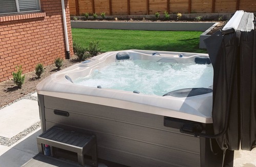 North Salt Lake House | Hot Tub Retreat Fire Pit, BBQ & Mountain Adventures Near Airport & Lagoon