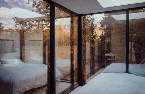 Huntsville House | ILMA - AIR - Creekside Mirrored Glass Home