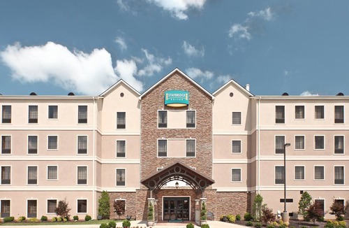 Rogers Condo | King Suite. Free Breakfast. Gym. Near Mercy Hospital Northwest Arkansas!