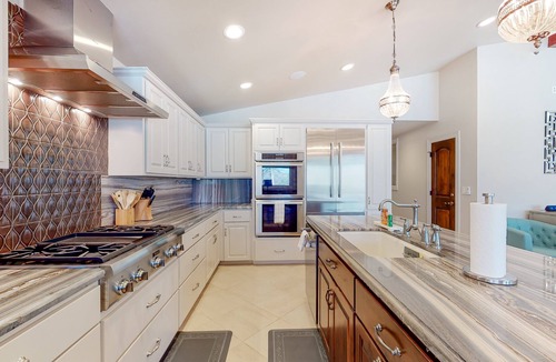 McQueeney House | Lakefront home with hot tub, dock, kayaks, central AC, & great lake views