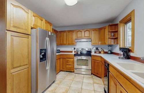 Malletts Bay House | Lakefront home with water access, views of the mountains, private deck & patio