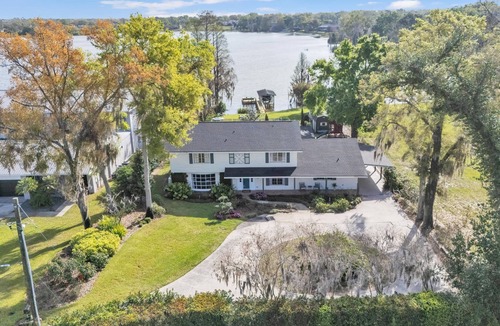 Winter Haven House | Lakeside Adventure Retreat | Heated Pool, Game Room & Private Dock | Optional Boat Cruise