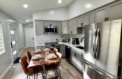 Logan Apartment | Luxury brand new private guesthouse With deck in downtown