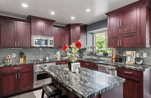 Millcreek House | Mountain Views! Spacious & Stylish w/Covered Deck, Fenced Yard, BBQ & Firepit