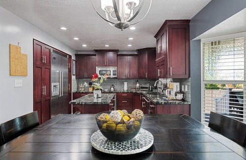 Millcreek House | Mountain Views! Spacious & Stylish w/Covered Deck, Fenced Yard, BBQ & Firepit