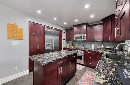 Millcreek House | Mountain Views! Spacious & Stylish w/Covered Deck, Fenced Yard, BBQ & Firepit