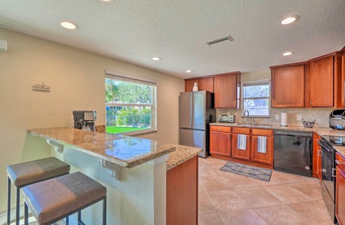 New Port Richey Cottage | Riverfront Home w/Putting Green & Boat Dock!