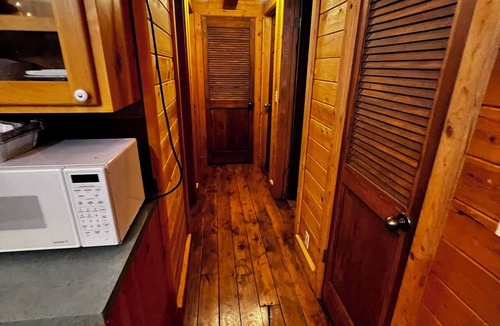 Snowbird Cabin | Secluded forest cabin with lush yard and great loft.Recreation of all types near
