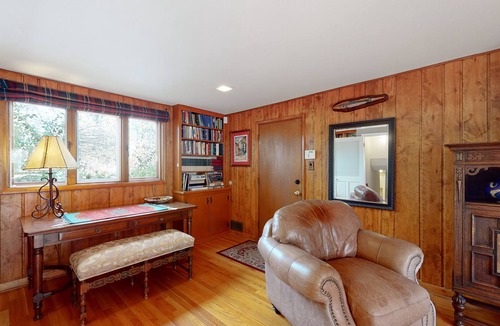 Skyway House | Spacious estate with fenced yard, private pond, outdoor fireplace, & home gym