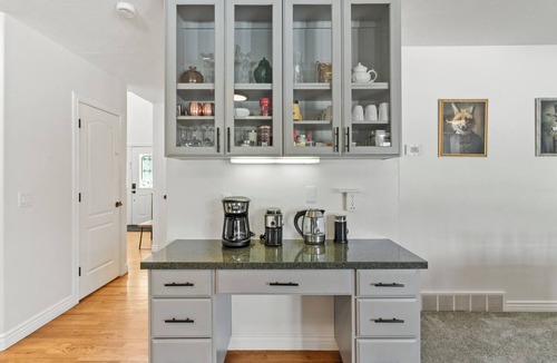 Draper House | Spend your days exploring the mountains, come home and soak in the hot tub, grill on the deck, reconnect with family and friends in the thoughtfully designed comfortable retreat with both intimate and large gathering spaces.
