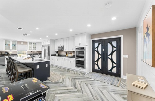 Panama City Beach House | Stunning beach retreat with backyard oasis + heated pool!