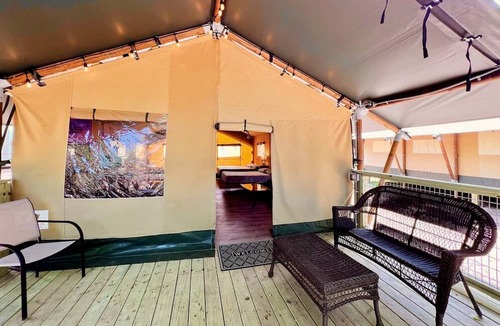 Fentress RV Rental | Texas Creekside Safari Tent Glamping Perfect for Nature Retreats for Water Sports Enthusiasts
