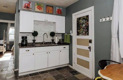 Central City House | Unique Eclectic Tudor - King Bed! Parking! 30 Night Minimum.