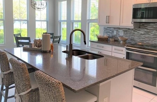 Whitney Beach Villa | Waterfront on Anna Maria Island Sound ~ Beaches, Pool, Country Club Style...