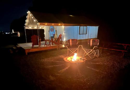 Gorgeous Secluded Tented Cabin Fire Pit Provided in Cassville, Missouri