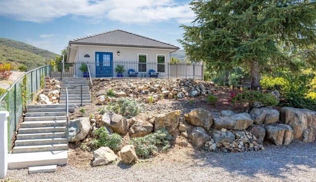 Perched atop the tranquil Lake San Marcos, Private and panoramic Views.
