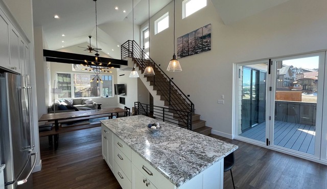 Spacious 5 bedroom house + bunkroom with rooftop deck and private hot tub
