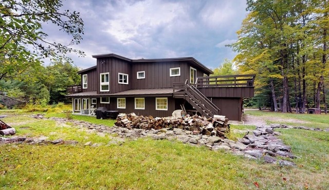 Unique & quaint home with loads of character, firepit, two wood stoves, & grill