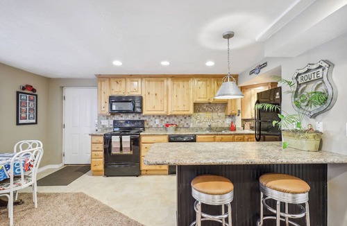 American Fork Apartment | Secret Garden Retreat | Private Patio | Kitchen