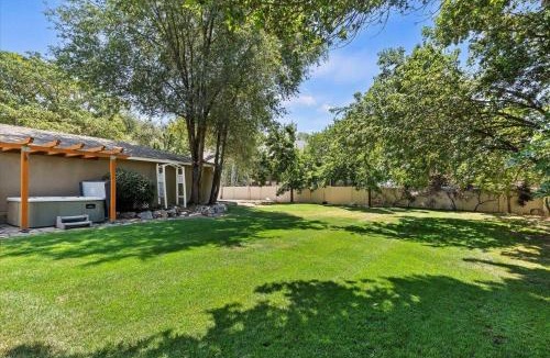 Millcreek House | Riviera Retreat in Salt Lake with Private Hot Tub and Theater