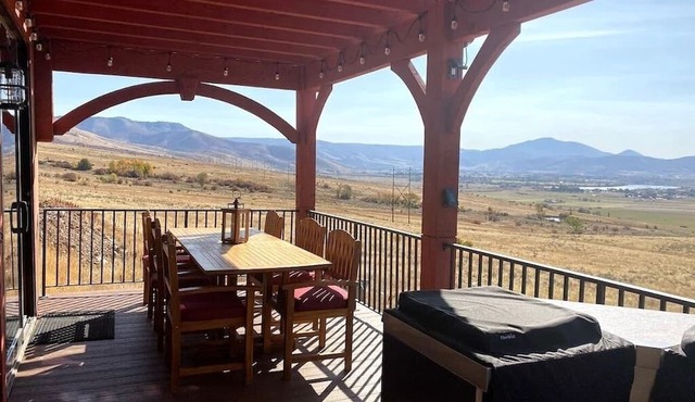 Gorgeous 5 bedroom 4.5 bath home with incredible mountain and lake views.