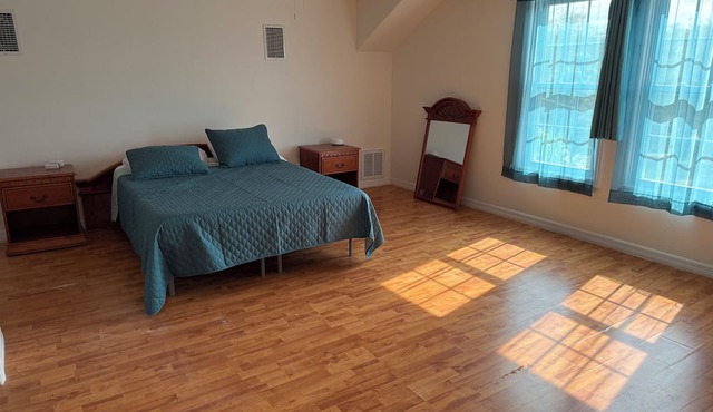 Spacious 5-bedroom beautiful water view home with private boat dock steps away.